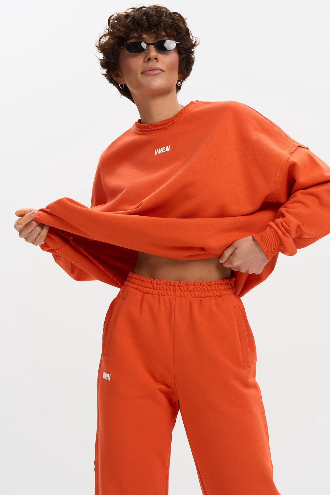 WOMEN’S SWEATSHIRT WITH RAW EDGES ORANGE | MMSW