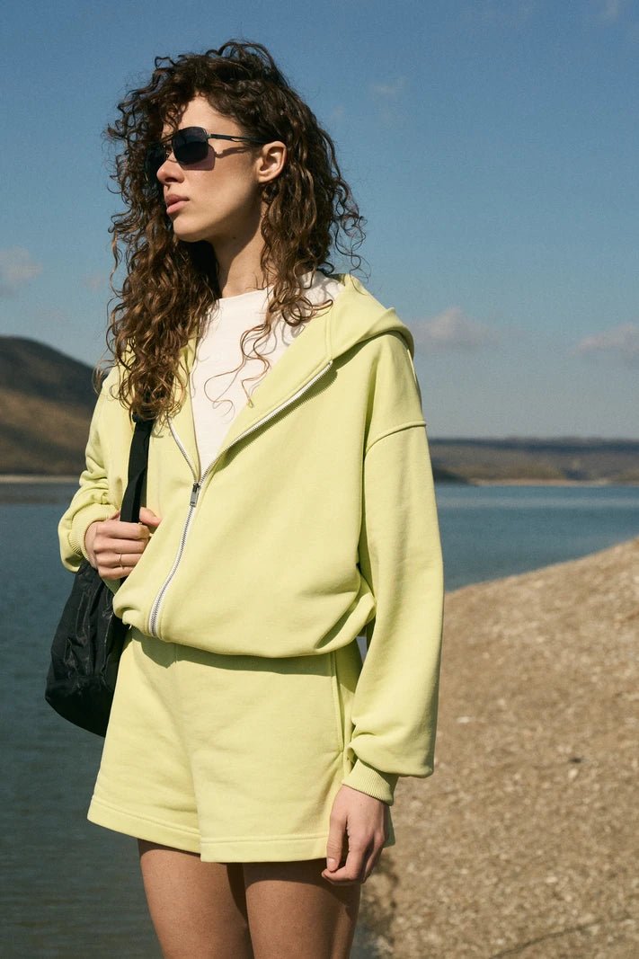 WOMEN’S ZIP-UP HOODIE WITH ADJUSTABLE HEM LIGHT LIME | MMSW
