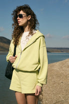 WOMEN’S ZIP-UP HOODIE WITH ADJUSTABLE HEM LIGHT LIME | MMSW